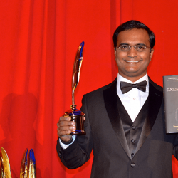 Praveen Narra receiving Quilly Award