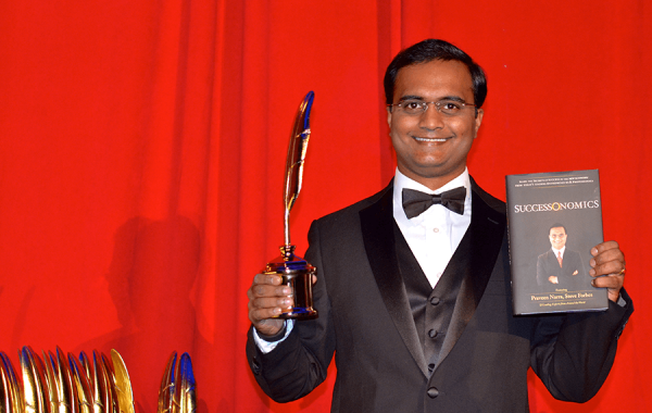 Praveen Narra receiving Quilly Award