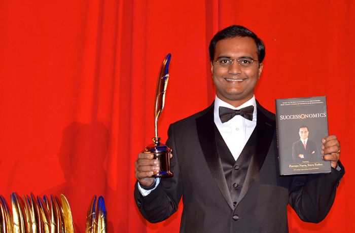 Praveen Narra receiving Quilly Award